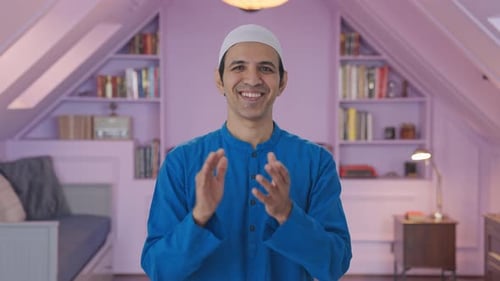 Happy Muslim man saying clapping and appreciating