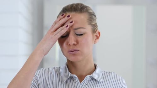 Woman Suffering From Headache, Close Up