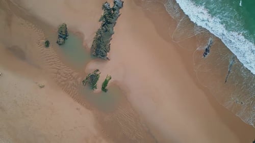 Waves Meeting Sandy Shoreline in Aerial View Empty Summer Coast with Turquoise