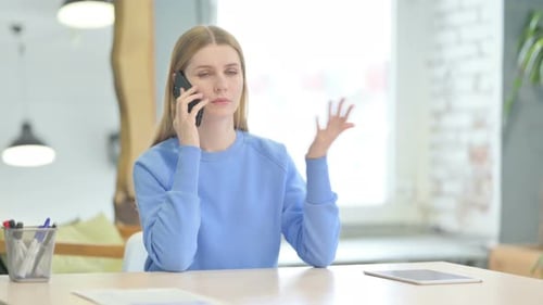 Angry Woman Shouting at Work in Frustration
