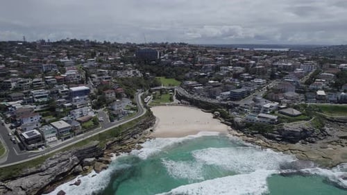 Lowering On The Cove Beach Of Tamarama In Mackenzies Bay, Sydney, Australia. Aerial Drone Shot