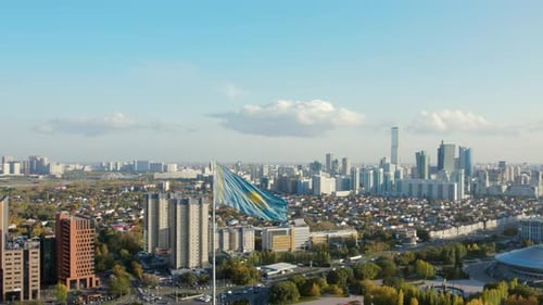 Waving Kazakhstan flag in Astana city