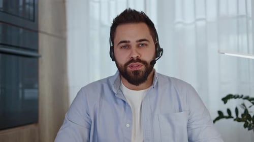 Young Adult Using Headset for Video Conference