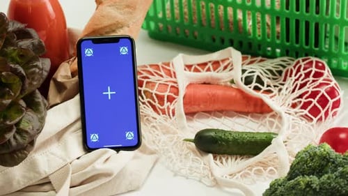 Food Shopping Delivery Online Shop Application Smartphone with Blue Chroma Key Screen and Fresh