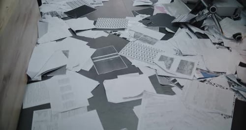 Detectives Investigating Messy Crime Scene in Office