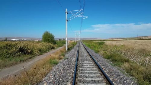 Railway Tracks Stretching into Distance