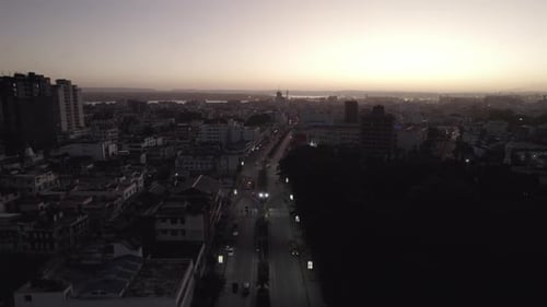 Aerial stock footage Mombasa City center golden hour to night