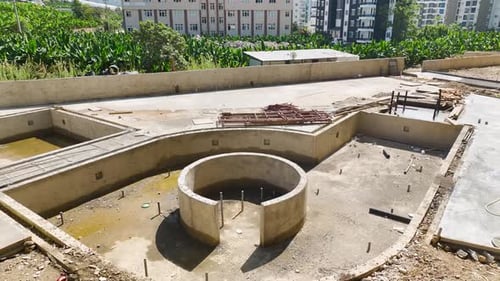 Aerial View Coastal Property Construction Renovating Facades Building Pools and Landscaping