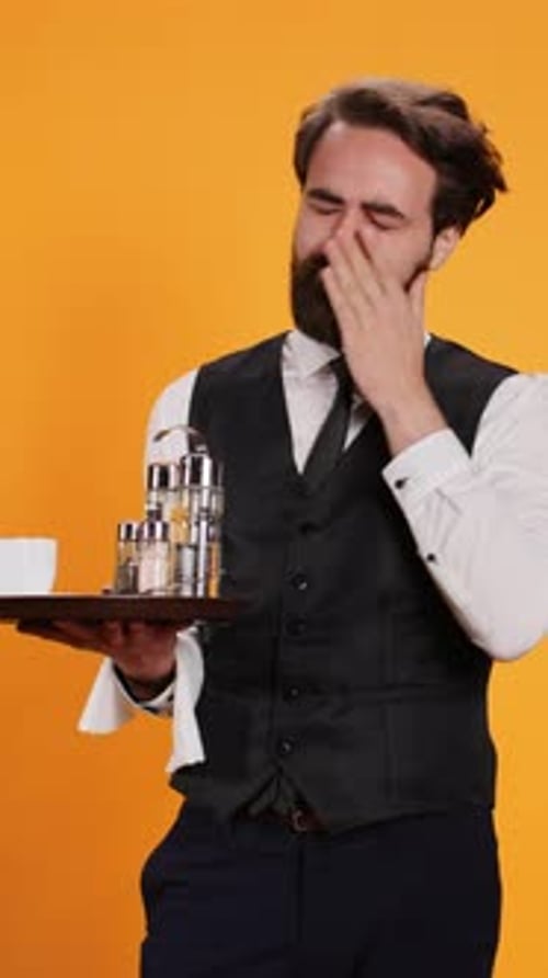 Vertical Video Exhausted Butler Feels Sleepy on Camera