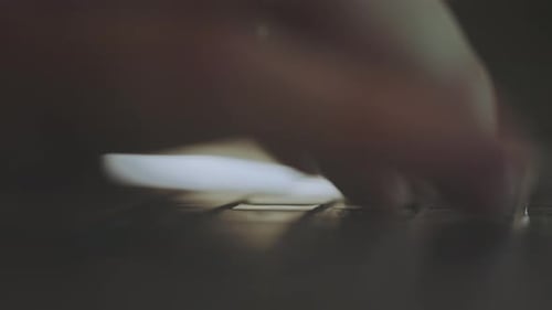Businessman typing on laptop