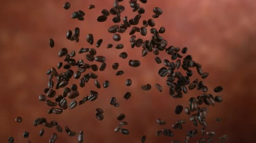Geröstete Kaffeebohnen schweben in Zeitlupen-Phantom Flex 4K-Makroaufnahme