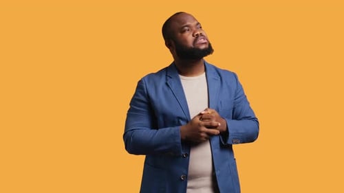 Happy Man Pleased with Himself Feeling Blessed Studio Background