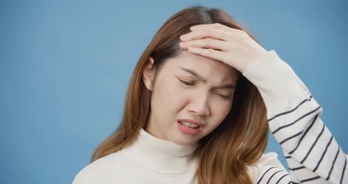 Woman suffering from headache