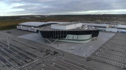 Aerial view of an extraordinary glass facade building