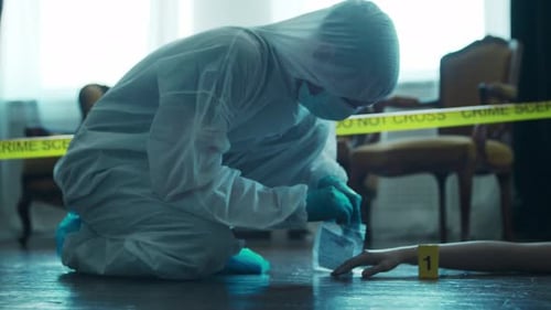 Crime Scene Investigator Collects Evidence