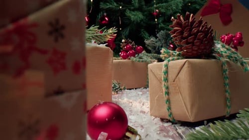 Christmas Gifts Under Decorated Tree in Night