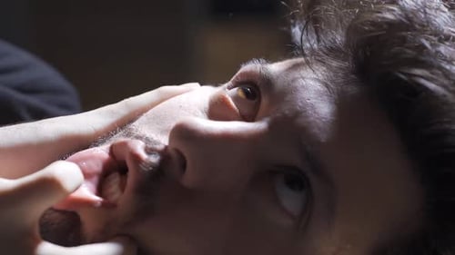 Close Up of Man with Contorted Face