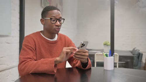 Young Adult Making Video Call With Smartphone