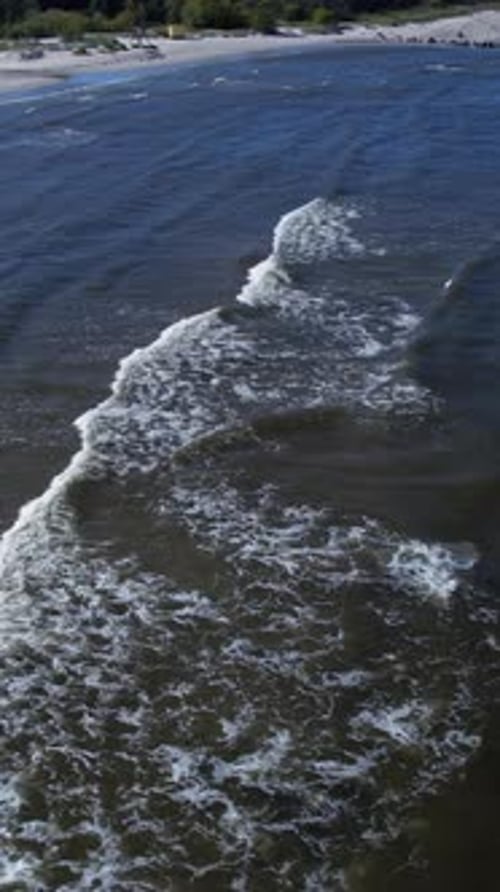 An aerial view of a beach and water
