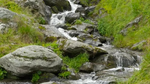 Rushing Water Flowing Down a Picturesque Mountain Stream