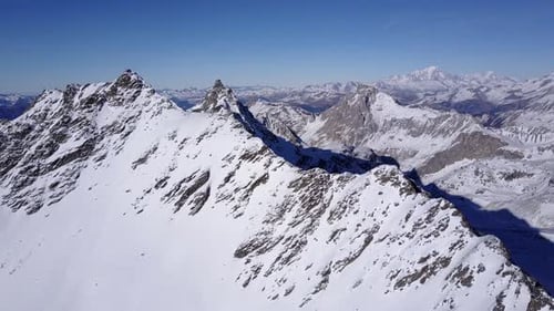 Aerial flight above stunning Alps.