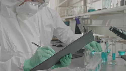Team of Microbiologists Doing Research in Lab