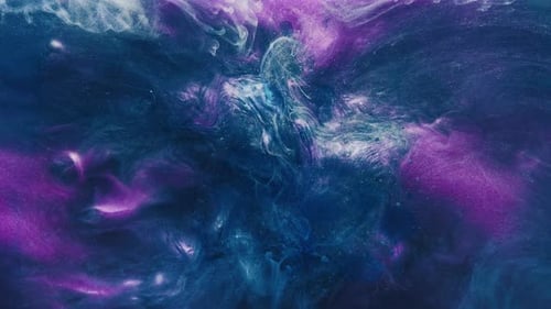 Abstract Blue and Purple Ink Swirls in Space