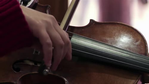 Violin Being Played With Bow in Close Up