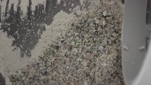 The glass bottles are crushed into small pieces.