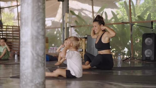 Adorable Kids During Their Training At Yoga Class In Koh Phangan Spiritual Center Thailand