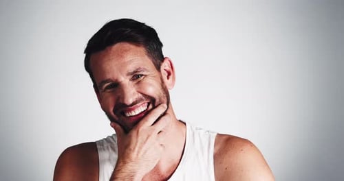 Studio, self care and man with beard, face and smile for fresh shave, routine and facial treatment