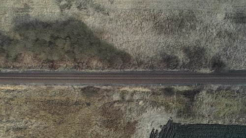 Sky view of a rail track with train Hungary in winter