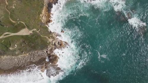 Aerial view of cliff meeting the sea, Portugal.