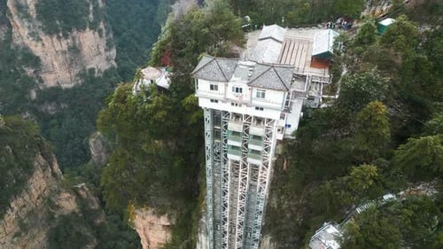 Aerial orbit establishes Bailong elevator house in Zhangjiajie China