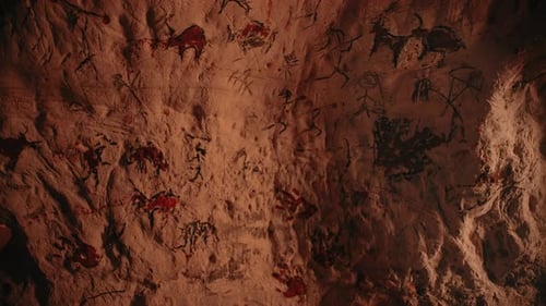 Ancient Cave Paintings on Rock Wall in Cave