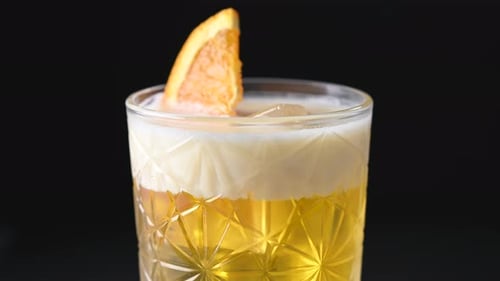 Cocktail in Glass with Orange Slice Garnishing