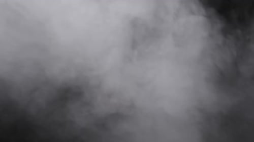 White Smoke Billows on Black Background
