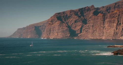 Cliffs and ocean view on coastline Acantilados de Los Gigantes in Tenerife, Canary Islands. Slow-mot