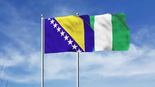 Bosnia and Herzegovina and Nigeria Flags Waving on Flagpoles Against Blue Sky