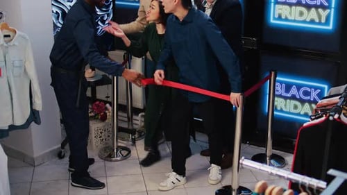 Customers Scuffle Waiting for Black Friday Sales