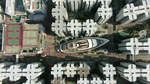 Aerial view of Hong Kong Whampoa buildings and unique Cruise Ship shaped shopping mall.