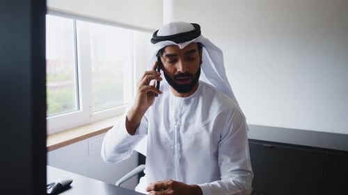 businessman working in a modern office in the united arab emirates.