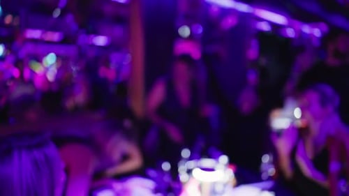 Blurred People Celebrating in Night Club, Party