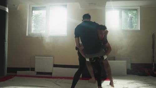 Athlete Throws Partner in Defending Attack in Club