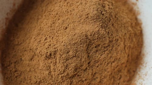 Close up of Brown Powder Falling