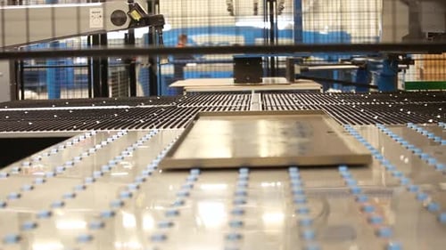 Automated Industrial Machinery Processing Metal Sheet in Factory