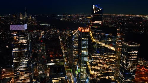 Rising above the splendid cityscape of New York. Night city view from drone footage.