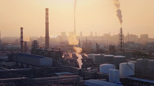 erial view of chimneys of power plant, an industrial district. Modern large thermal power plant