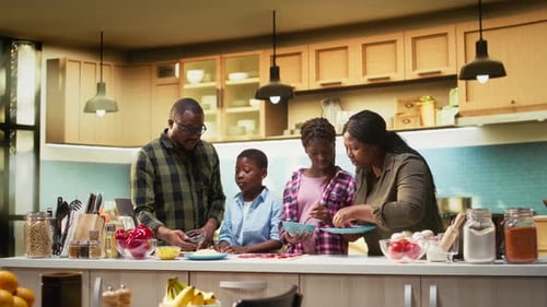 Parents and Children Having Fun in the Kitchen Cooking Homemade Pizza