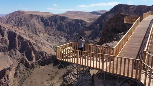 Aerial View Of Man Taking Photo At Observatory On Cliffs